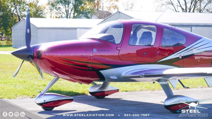 David Klasing's red Cirrus SR22 Aircraft